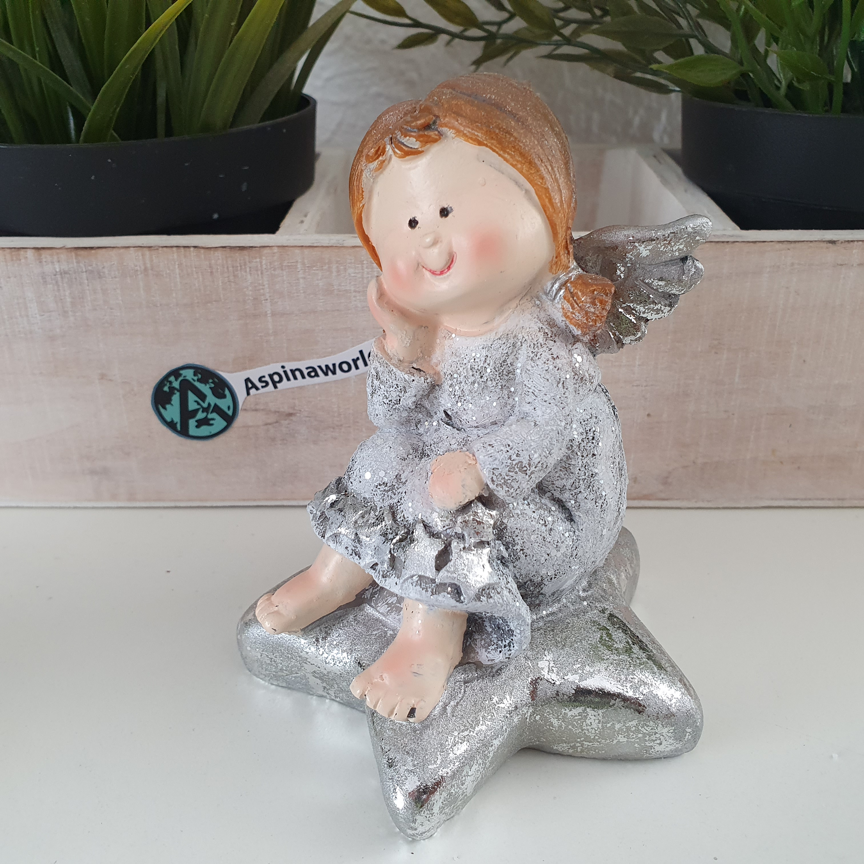 Engel sitzt auf einem Stern  Silber 12 cm